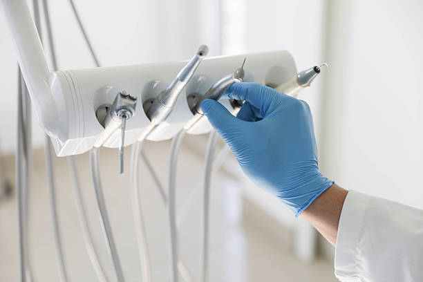 Professional Root Canal Treatment technician working in Level Park-Oak Park, MI